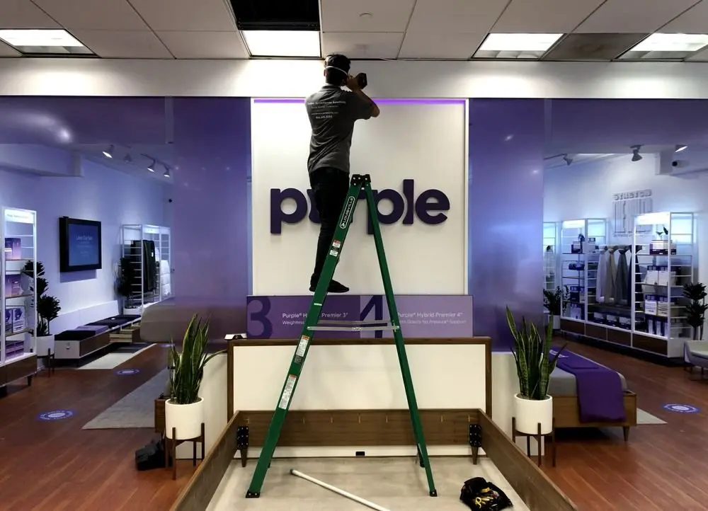 Camera installation coordinated around a finished retail space — Three Factor Security fieldwork in Los Angeles